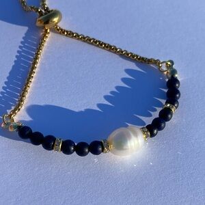 Lapis lazuli freshwater pearl and crystal bolo bracelet